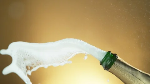 Super slow motion of Champagne explosion, opening champagne bottle closeup Stock Footage 116676262