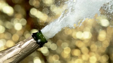 Super slow motion of Champagne explosion, opening champagne bottle closeup Stock Footage 144456962