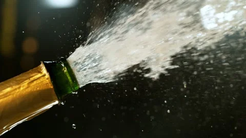 Super slow motion of Champagne explosion with flying cork closure Stock Footage 292968044