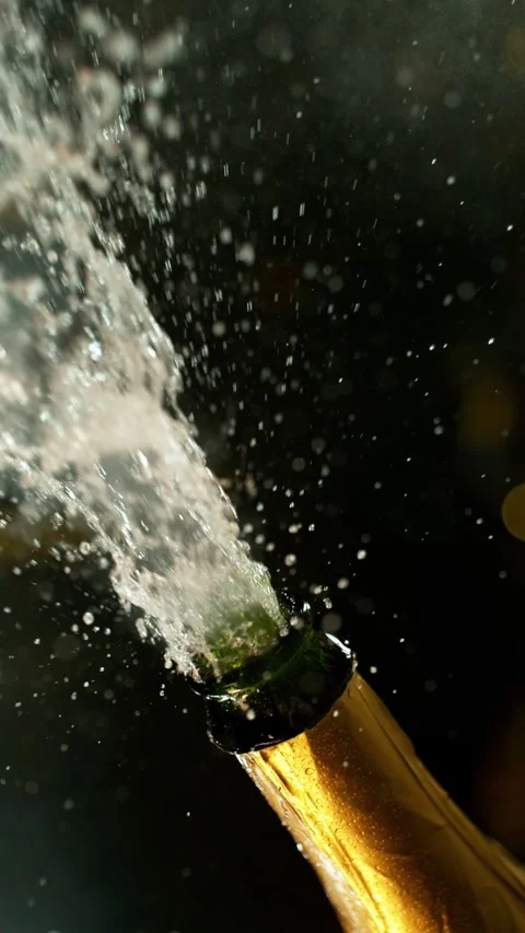 Super slow motion of Champagne explosion with flying cork closure Stock Footage 292968114