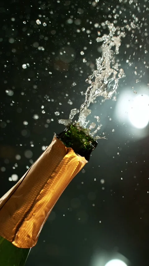 Super slow motion of Champagne explosion with flying cork closure Stock Footage 292968121