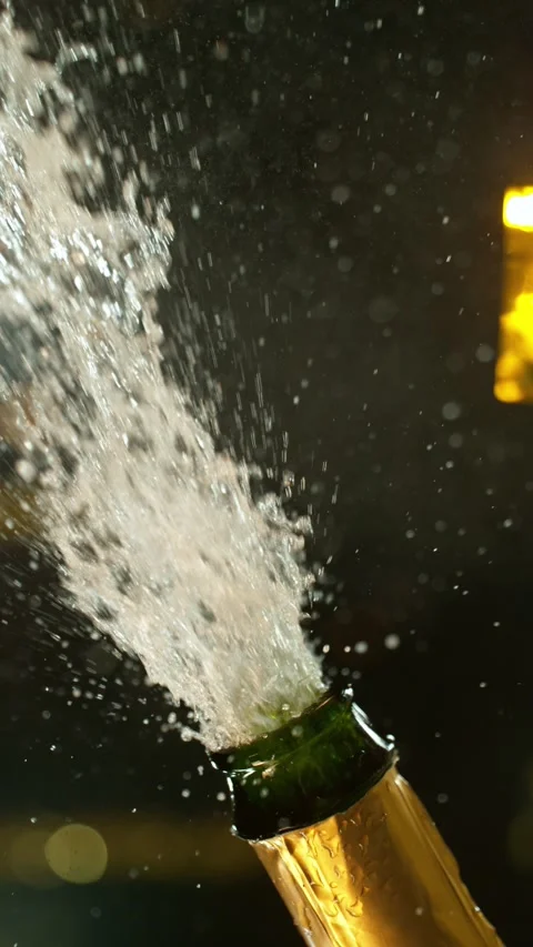 Super slow motion of Champagne explosion with flying cork closure Stock Footage 292968172