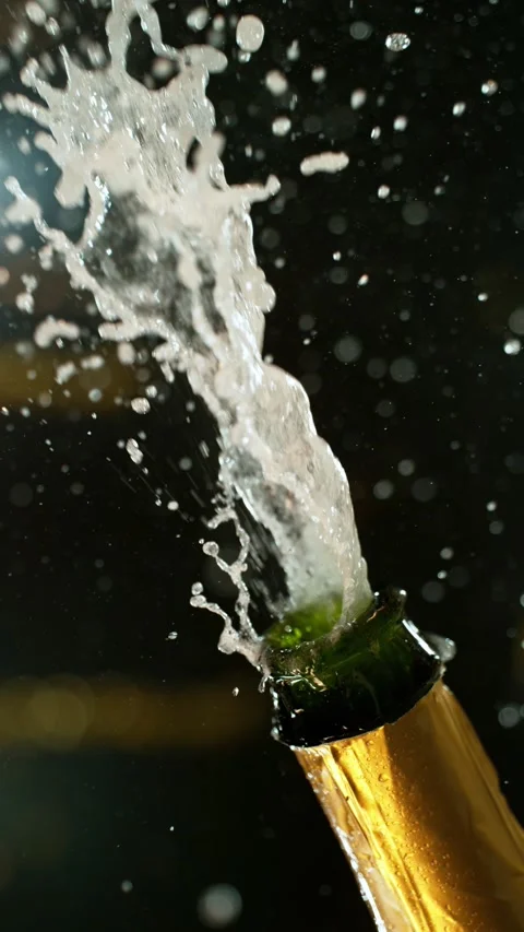 Super slow motion of Champagne explosion with flying cork closure Stock Footage 292968288