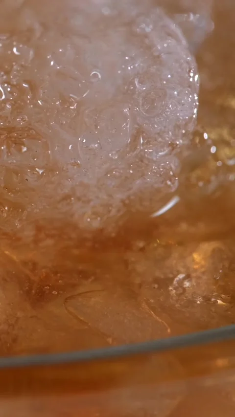 Super slow motion, Chef Tests Fizz On Crushed Ice Micro Bubble Closeup Stock Footage 330111090