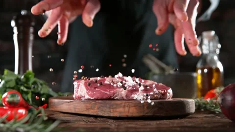 Super slow motion of chef throwing spice... | Stock Video | Pond5