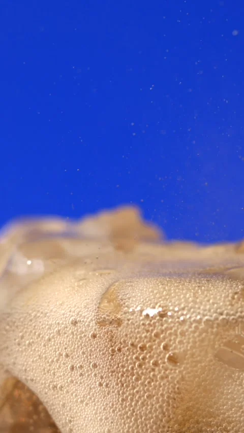 Super slow motion, Close Up Cola Pouring Over Ice, Super Slow Motion Capture Stock Footage 330273519