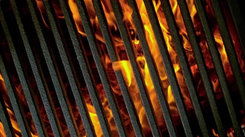 Super Slow Motion Close-Up of Hot Grill Grate with Glowing Embers and Flames at Vídeos de archivo 307828868