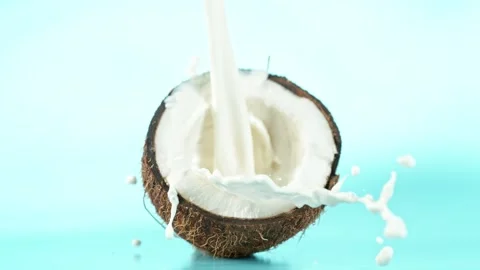 Super Slow Motion of Coconut With Milk Splash Stock Footage 247693841