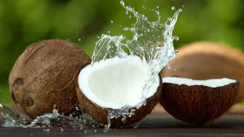 Super slow motion of coconut with splash Stock Footage 107056227