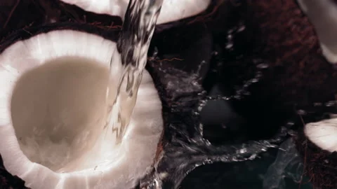 Super slow motion of coconut with water splash Stock Footage 168296371