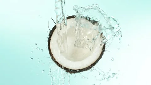 Super Slow Motion of Coconut With Water Splash Stock Footage 247693336