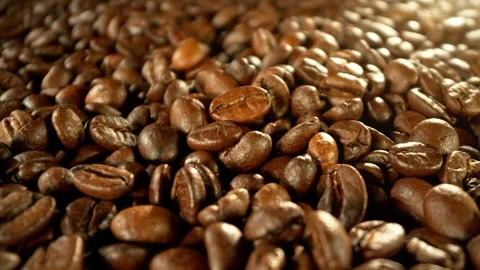 Super Slow Motion of Coffee Beans Rotating in Roasting Grinder. Stock Footage 284554881