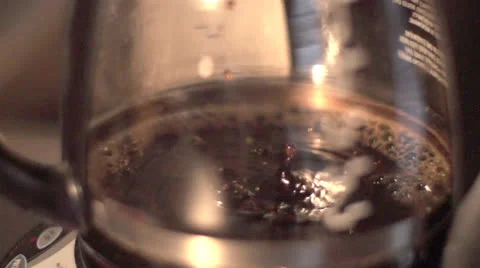 Super slow motion coffee pot Vídeos de archivo 25446375