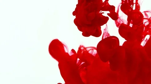 Super slow motion of coloured inks in water. Isolated on white background. Stock Footage 127579334