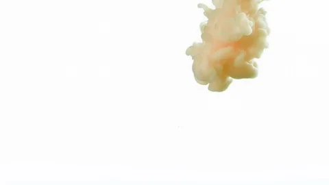 Super slow motion of coloured inks in water. Isolated on white background. Stock Footage 127579615