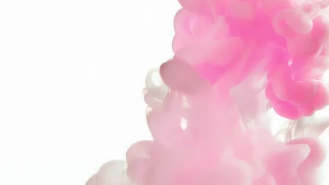 Super slow motion of coloured inks in water. Isolated on white background. Stock Footage 127579711