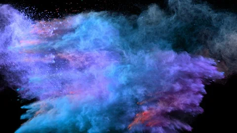 Super slow motion of coloured powder explosion isolated on black background. Stock Footage 122000965