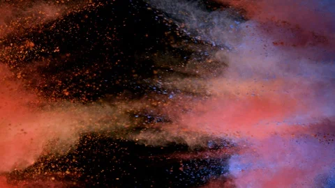 Super slow motion of coloured powder collision isolated on black background. Stock Footage 125043365