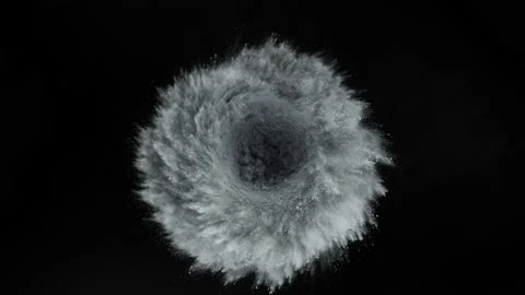 Super slow motion of coloured powder rotation isolated on black background. Stock Footage 139044142