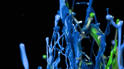 Super slow motion of dancing colours shapes isolated on black background. Video stock 139656064