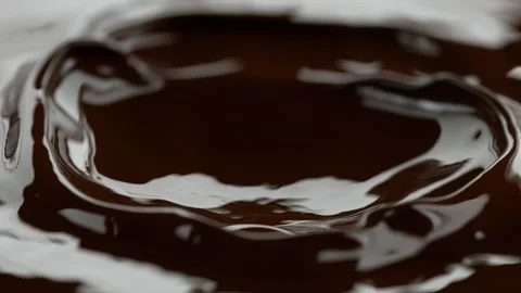 Super slow motion of dark hot chocolate splashing. Stock Footage 168572301