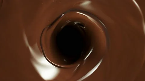 Super slow motion of dark hot chocolate twister Stock Footage 213380560
