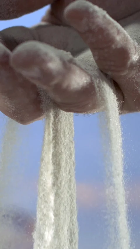 Super Slow Motion Deliberate Slow Motion Focusing On Fingers Sorting Gritty Video stock 335848264