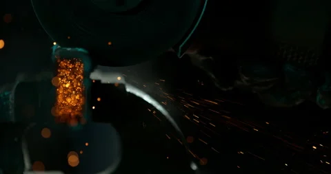 Super slow motion of detail of circular saw cutting iron pipe. Stock Footage 216906523