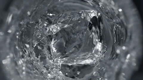 Super Slow Motion Detail Shot of Ice Cube Falling into Glass with Vodka at 1000 Stock Footage 246565582