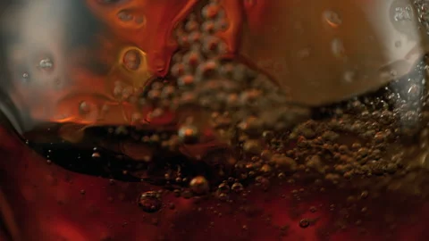 Super Slow Motion Detail Shot of Waving Cola Lemonade Background at 1000fps. Stock Footage 329077573