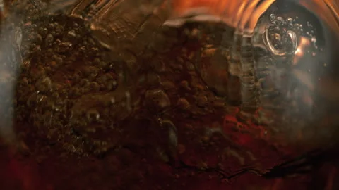 Super Slow Motion Detail Shot of Waving Cola Lemonade Background at 1000fps. Stock Footage 330139506
