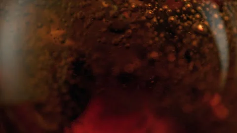 Super Slow Motion Detail Shot of Waving Cola Lemonade Background at 1000fps. Stock Footage 330424835