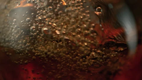 Super Slow Motion Detail Shot of Waving Cola Lemonade Background at 1000fps. Stock Footage 332284591