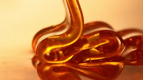 Super Slow Motion of Dripping Honey in Detail. Stock Footage 285643759