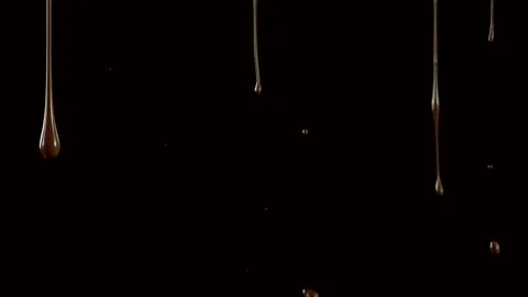 Super slow motion of dripping hot chocolate. Stock Footage 140338971