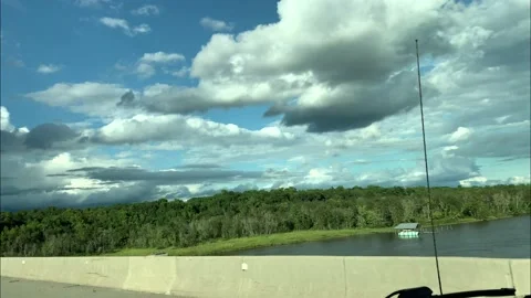 Super Slow Motion Driving Over Bridge VA 4K Stock-Footage 210214760