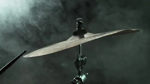 Super slow motion of drummer banging on cymbal with colored powder explosion Stock Footage 211712998
