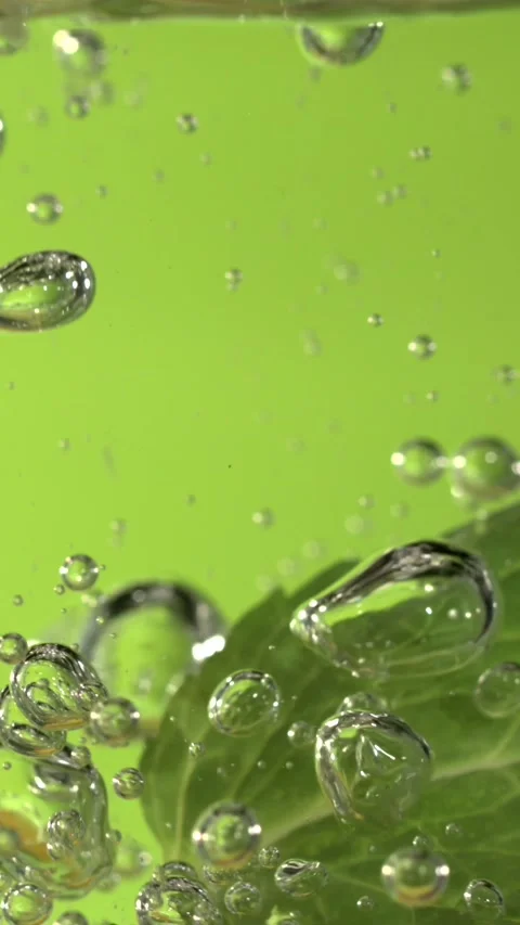 Super Slow Motion Effervescent Soda Infused With Vibrant Citrus Zest And Stock Footage 327096274