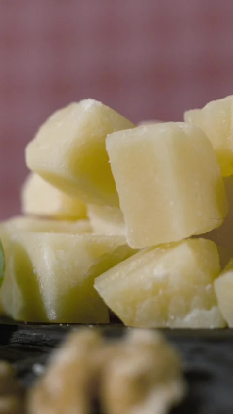 Super Slow Motion Elegant Arrangement Of Soft Cheese Cubes With Fresh Grapes Stock Footage 334079632