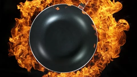 Super slow motion of empty wok pan and fire blast on black background Stock Footage 145558069