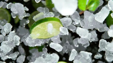 Super Slow Motion of exploding crushed ice with limes Stock Footage 123167951