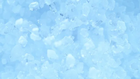 Super slow motion of exploding crushed ice, top view shot Stock Footage 129599777
