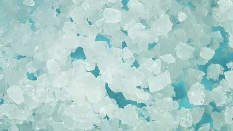 Super slow motion of exploding crushed ice, top view shot Stock Footage 129600627
