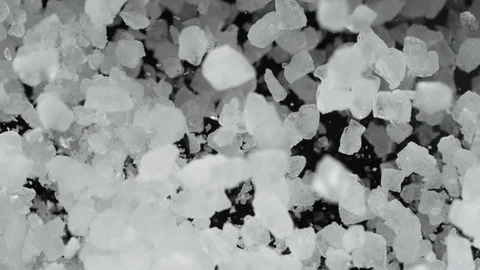 Super slow motion of exploding crushed ice, top view shot Stock Footage 129600728