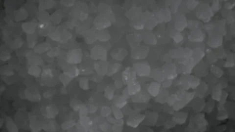 Super slow motion of exploding crushed ice, top view shot Stock Footage 129600739