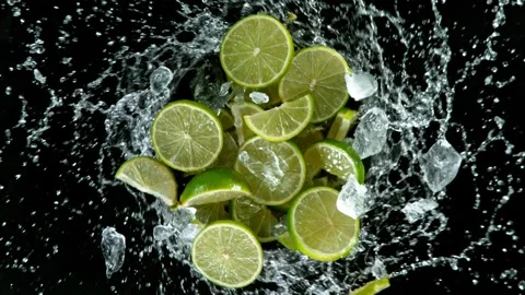 Super Slow Motion of exploding crushed ice with limes Stock Footage 134592761