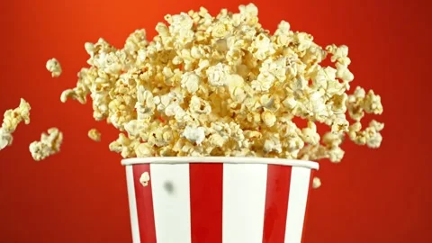 Super Slow Motion of Exploding popcorn from Bucket. Stock Footage 261972105