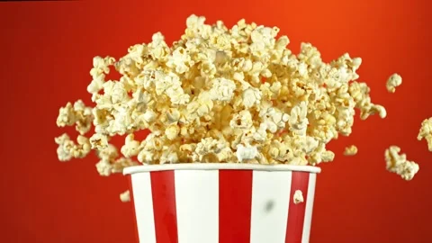 Super Slow Motion of Exploding popcorn from Bucket. Video stock 261972189