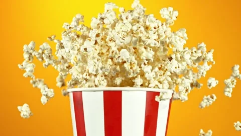Super Slow Motion of Exploding popcorn from Bucket. Stock Footage 261972195