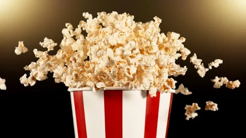 Super Slow Motion of Exploding popcorn from Bucket. Stock Footage 262616483